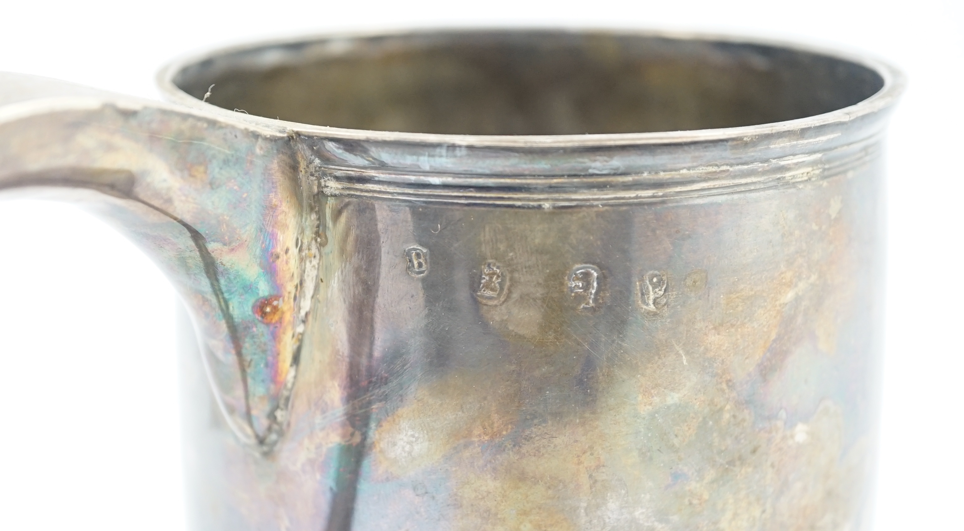 A Queen Anne silver mug, by Richard Bayley?